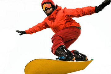 Portrait of young man in sportswear with snowboard isolated on a white studio background. The...