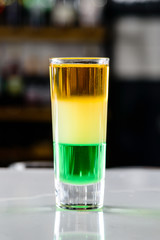 alcohol shot on the bar background