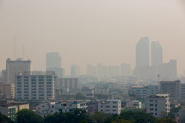 Fototapeta na wymiar Office building under smog in Bangkok