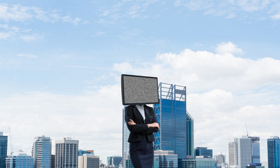 Business woman with TV instead of head.