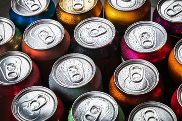 Foto op Plexiglas aluminum cans of soda background. the view from the top © OlegDoroshin