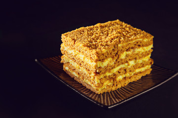 Honey cake. dark background