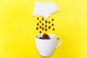 Coffee cup and coffee beans on white background