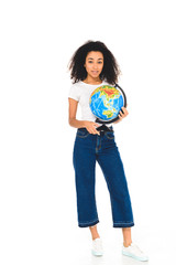 curly african american young woman holding globe isolated on white