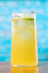 classic mexican cocktail chelada on the bar