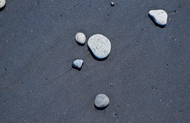 Black volcanic sand background