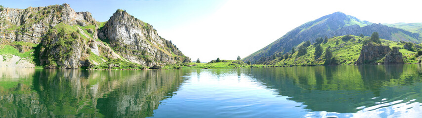 Naklejka na ściany i meble sky reflection in a mountain lake