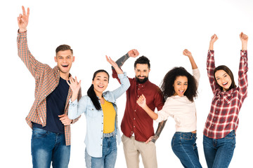 Obraz premium happy multicultural group of people smiling with hands above head isolated on white