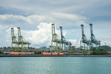 Fototapeta na wymiar Singapore cargo terminal,one of the busiest Import, Export, Logistics ports in the world, Singapore. 