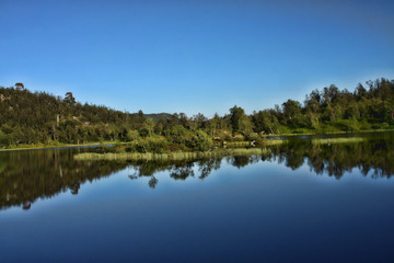 Fototapeta na wymiar Quiet forest lake in Finland