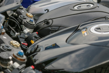 Fototapeta na wymiar Details of black motor bikes