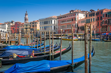 Fototapeta premium Old gondola boats and Venice channel view
