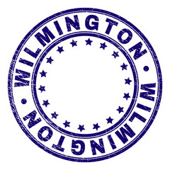 WILMINGTON stamp seal watermark with grunge style. Designed with circles and stars. Blue vector rubber print of WILMINGTON caption with grunge texture.