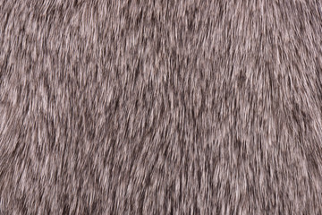 Fragment of rabbit fur close-up. Gray rabbit fur.