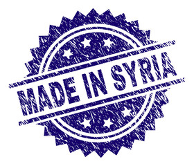MADE IN SYRIA stamp seal watermark with distress style. Blue vector rubber print of MADE IN SYRIA title with dust texture.