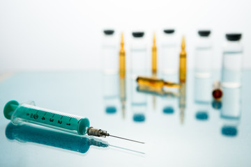 Medical Vaccine vial hypodermic injection treatment disease care in hospital and prevention illness.