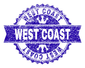 WEST COAST rosette stamp watermark with grunge texture. Designed with round rosette, ribbon and small crowns. Blue vector rubber watermark of WEST COAST text with scratched style.