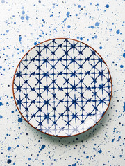 Empty porcelain china dish on white background