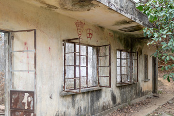 Fototapeta na wymiar Ruin of an abandoned house