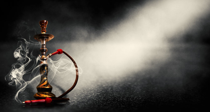 Dark black background of smoking hookah on the concrete floor, in clouds of  smoke and neon light Stock Photo | Adobe Stock