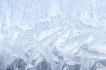Frosty patterns on a frozen ice box in the early morning