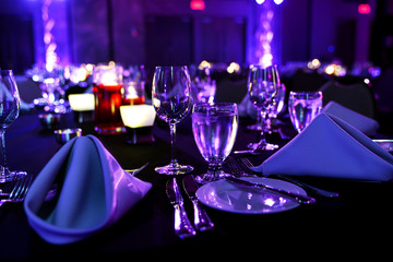 Glassware and Plates Set up On a Table