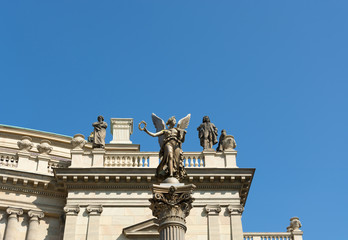 Obraz premium Angel statue column in front of Concert Hall Rudolfium, Prague, Czech Republic