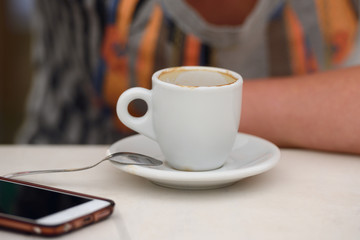 cup after drinking coffee on a table close-up