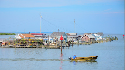 Tangier Channel is lined with fishermens docks, built on stilts in the water