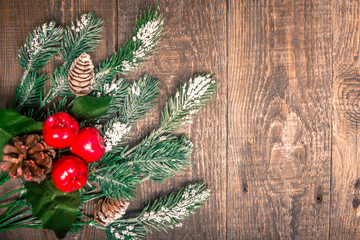 red berries with pine branches