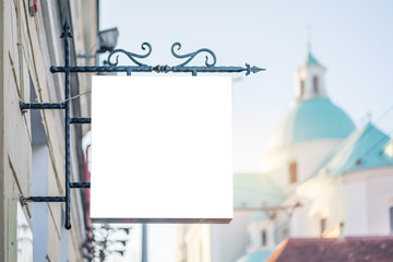 empty white advertising signboard on the background of the city, mock up