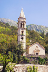 Religious architecture.  Montenegro, Perast town. View of  Church of Our Lady of Rosary and its...