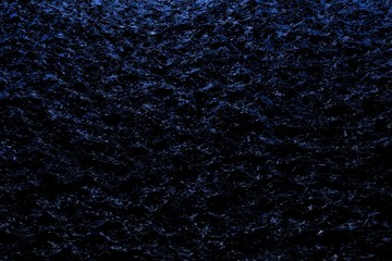 cute blue holiday shining dark night water with lights - abstract background of electric lights reflected in black liquid