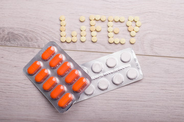 Orange and white pills in pack