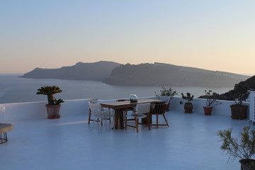 Fototapeta premium Beutiful sunset view on a volcano in the blue sea
