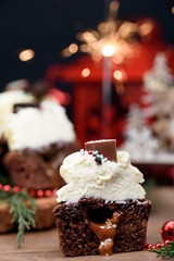 Chocolate, tasty and sweet cupcake with vanilla cream and condensed milk inside, painted in the fashionable color of 2019.