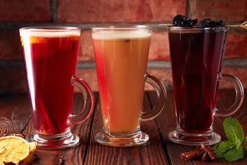 Three glasses with hot alcoholic drinks