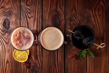 Three glasses with hot alcoholic drinks