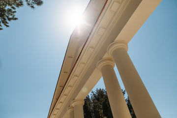 bottom-up view of the beautiful arch in sunny weather with a sun glare