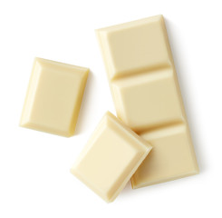 White chocolate pieces isolated on white background