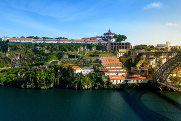 Obraz premium Dom Luis I bridge over Douro river and monastery of Serra do Pilar
