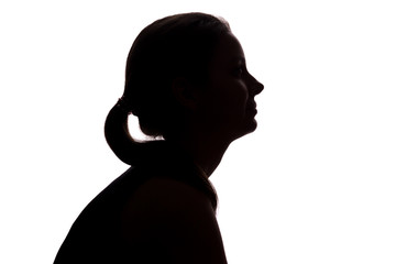 Young woman looking up - horizontal silhouette