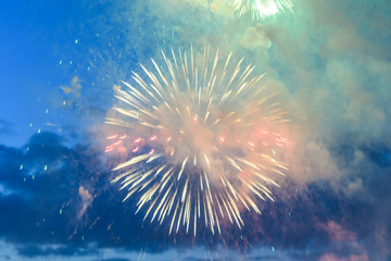 Celebratory fireworks in night time smoky closeup, concept celebration, festival, fun