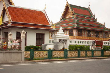 Streets of Thailand Facades of houses in front of the golden mountain