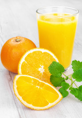 Orange on wooden table