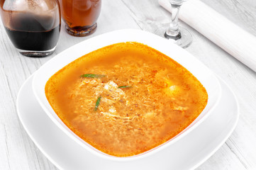 Egg soup on wooden table