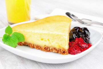 Cheese cake on wooden background