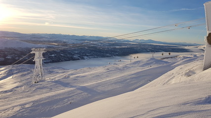 Ski lift on winter mountain