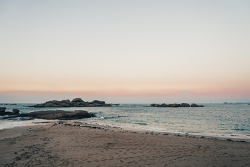 Fototapeta na wymiar Sunset over beach