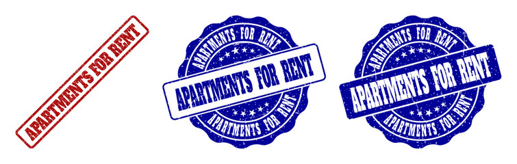 APARTMENTS FOR RENT scratched stamp seals in red and blue colors. Vector APARTMENTS FOR RENT labels with grunge surface. Graphic elements are rounded rectangles, rosettes, circles and text labels.